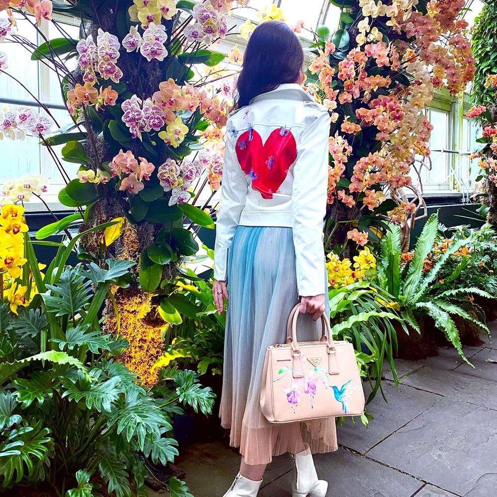White faux leather biker jacket size Small with hand painted heart